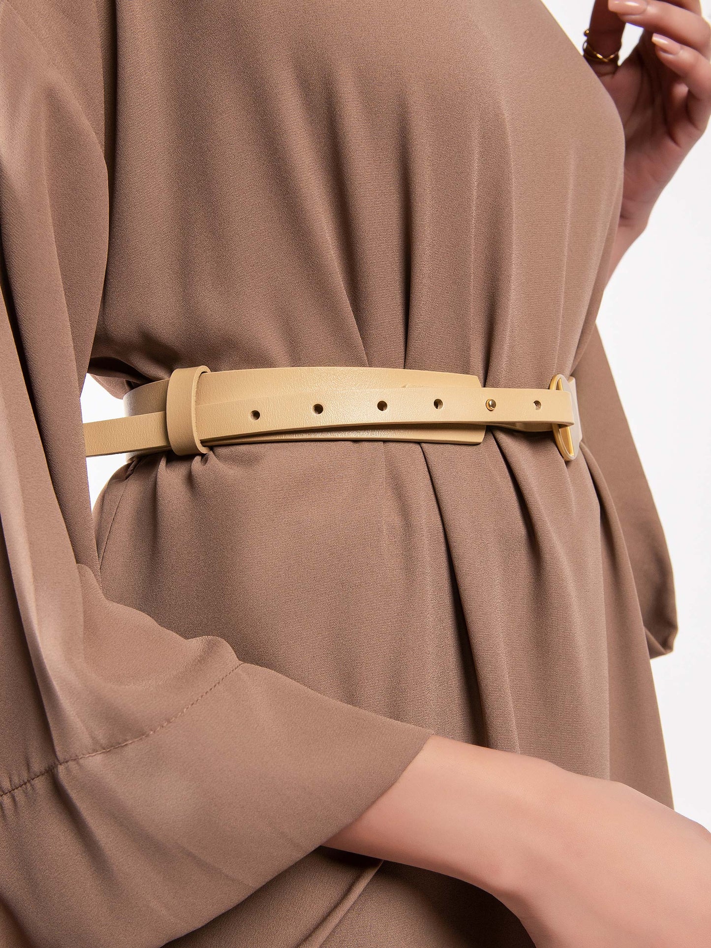 Circular Metallic Logo Belt